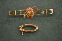 A decorative brooch.