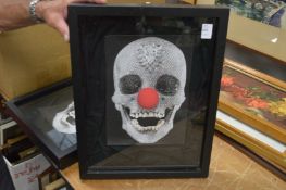 In the manner of Damien Hirst, Crystal Skull with Red Nose.