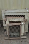 A quantity of Indian hardwood framed wrought iron window grilles.
