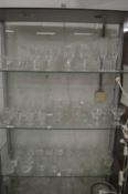 A quantity of good cut glass and etched glass drinking glasses.