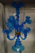 A large blue glass epergne.