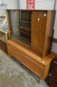 A 1970's teak bookcase and dressing table.