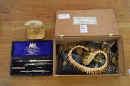 A gold wedding band and other jewellery.