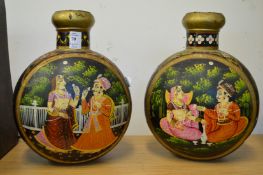 A pair of Indian decoratively painted moon flasks.
