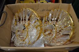 Two decorative chandeliers.