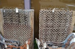 A quantity of wrought iron mesh grilles.