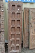 A pair of Indian carved hardwood panelled doors.