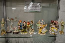 A collection of Capodimonte and similar figures and figure groups etc.