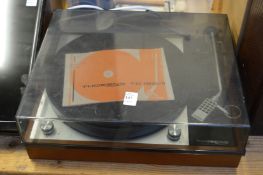 A Thorens TD150 turntable with original instruction manual.