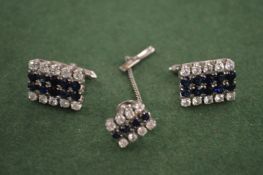Stylish cufflinks and tie stud.