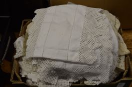 A box of table linen etc.