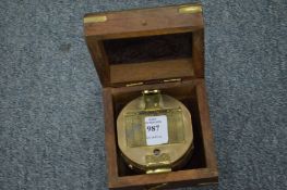 A reproduction compass, boxed.