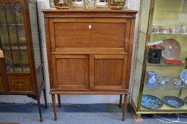 A mahogany side cabinet.