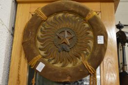 An unusual circular plaque 