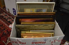 A small box of paintings and prints.