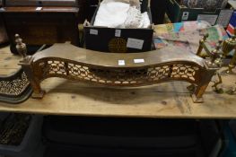 A brass serpentine fronted footman.