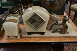 An Art Deco clock garniture.