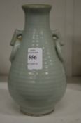 A small Chinese Celadon vase.