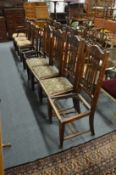 A set of four Art Nouveau high back dining chairs (one lacking seat).