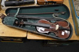 A cased violin and bow.