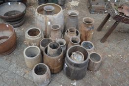A quantity of Indian turned wood bowls and vases.