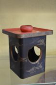 A Japanese lacquer stand.