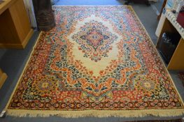 A cream ground, machine made Persian style carpet 285cms x 200cms.