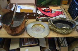 A copper coal scuttle, a brass dish and a cast metal jardiniere.