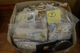 A box of mixed stamps.