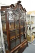 An 18th century Dutch walnut vitrine.