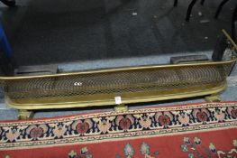 A pierced brass fender.