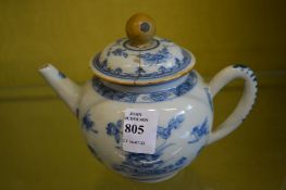 A Chinese blue and white teapot.