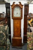 A 19th century oak longcase clock with painted arched dial.