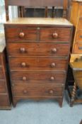 A 19th century mahogany narrow chest of drawers.