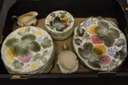 A quantity of Majolica style plates etc.
