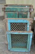 A quantity of Indian hardwood framed wrought iron window grilles.