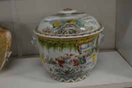 A Chinese Famille Rose porcelain bowl and cover, painted with children in a landscape.