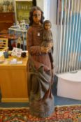 A large carved and painted Madonna and Child.