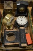 Various clocks and clock parts.
