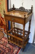 A Victorian inlaid walnut Canterbury what-not.