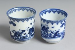 A NEAR-PAIR OF JAPANESE HIRADO BLUE AND WHITE PORCELAIN CUPS, each decorated with boys playing in