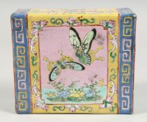 A CHINESE FAMILLE JAUNE / ROSE RECTANGULAR PORCELAIN PILLOW, painted with a panel to each side