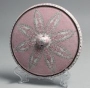 A CHINESE PINK GROUND ENAMELLED METAL CIRCULAR MIRROR, 16.5cm diameter.