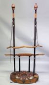 AN UNUSUAL CHINESE HARDWOOD TORTURE DEVICE, consisting of poles, leather straps and wooden yoke type