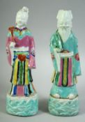 A PAIR OF 18TH CENTURY CHINESE PORCELAIN IMMORTAL FIGURES, both approx. 23cm high.