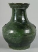 A LARGE CHINESE GREEN GLAZE TWIN HANDLE POTTERY VASE, with moulded bird motif drop ring handles,