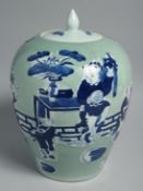 A CHINESE CELADON GROUND BLUE AND WHITE PORCELAIN JAR AND COVER, painted with figures and bats, 27cm