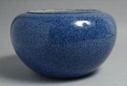 A LARGE CHINESE SPECKLED BLUE GLAZE VASE / PLANTER, 25cm diameter.