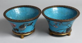 A SMALL PAIR OF JAPANESE BLUE-GROUND CLOISONNE JARDINIERES, the exteriors decorated with birds and