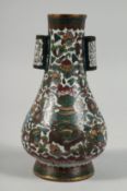 A CHINESE CLOISONNE TWIN HANDLE ARROW VASE, decorated precious objects, (with fault), 19cm high.